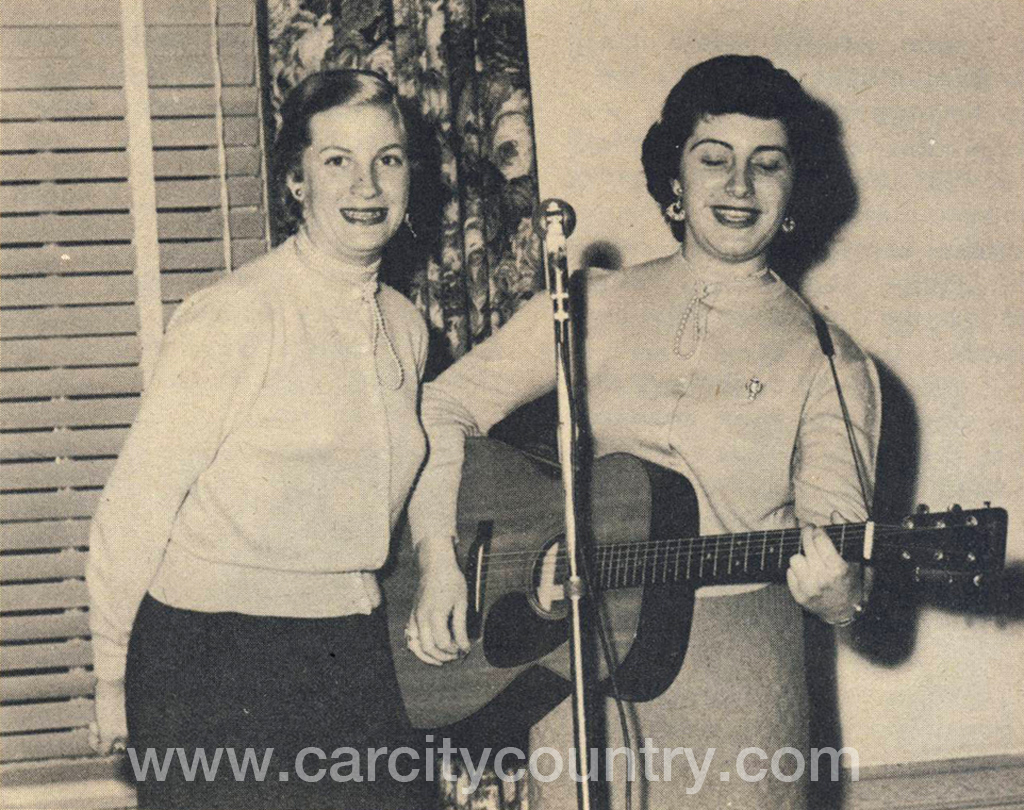 The Davis Sisters, Skeeter and Betty Jack. Snapshot ca. 1952, with microphone.